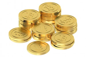 Golden Bitcoins isolated on white background